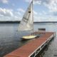 sail boat next to jack down on lake